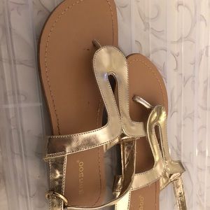 Gold and tan sandals